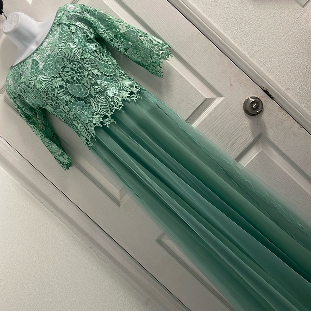 Brand new Green Lace Dress size 6